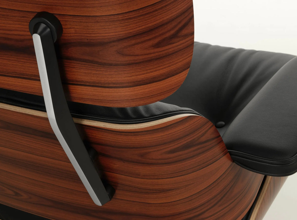 Vitra Eames Lounge Chair palisanteri/musta nahka myymälämalli Vitra